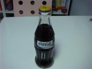 Coca Cola 2012 depozitolu şişe sarı kapak