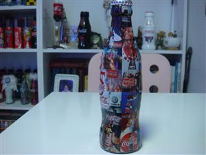 Coca Cola Almanya 75. yıl şişesi yan yüz